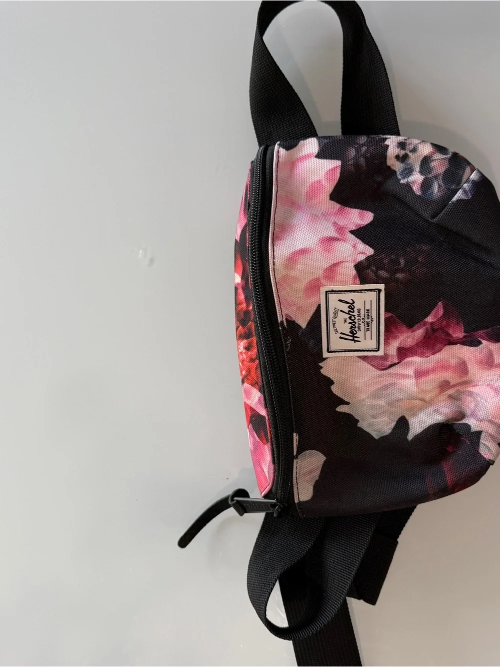 Herschel Supply Company Black Crossbody Sling with Pink Floral Print